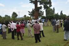 Risk communication responders and the Kween district leaders trying to appease family and friends of the second confirmed case who were getting agitated 