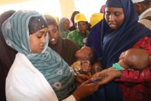 A HW marking  child after vaccination