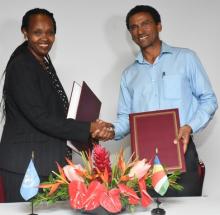 The Resident coordinator of the United Nations for Mauritius and Seychelles Christine Umutoni in a souvenir photo with Secretary of State Ambassador Barry Faure following signing of the SPF  (Photo: Seychelles Nation Newspaper)