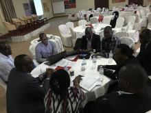 Dr Charles Draleku (center) Laboratory WHO Rwanda