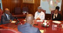 His Excellency Dr Mokgwetsi E.K. Masisi, President of the Republic of Botswana (left) in discussions with Dr Martins Ovberedjo, the outgoing WHO Representative to Botswana (right).jpg