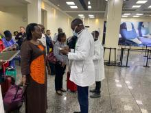 Minister of Health and WHO Representative during coronavirus screening on arrival at Kigali Aiport 