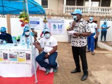 WHO Representative delivering statement on behalf of teh UN at the mock launch of the campaign in Freetown